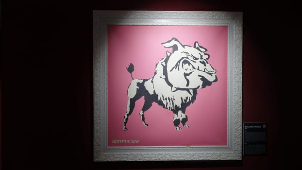 Stockholm, Sweden, December 29 2023. Art exhibition. The mystery of Banksy A genius mind. Dog.
