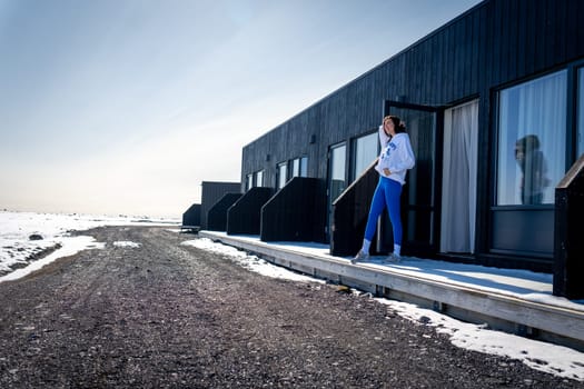 Woman in a lonely hotel in Nupar, Iceland