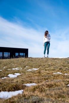 Woman in a lonely hotel in Nupar, Iceland