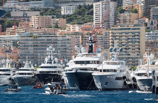 Monaco, Monte Carlo, 28 September 2022 - Top view of the famous yacht show, exhibition of luxury mega yachts, the most expensive boats for the richest people around the world, yacht brokers. High quality photo