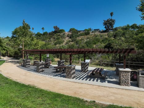Recreational facilities with table and barbecue in residential community park in San Diego, California, USA
