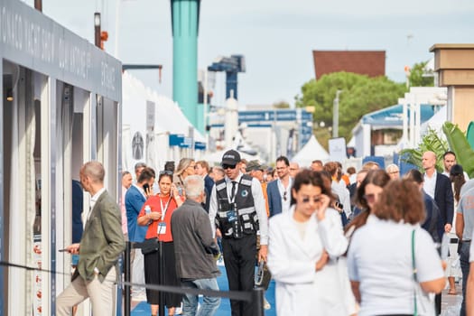 Monaco, Monte Carlo, 29 September 2022 - The famous motorboat exhibition, mega yacht show, clients and yacht brokers discuss the novelties of the boating industry, look at the mega yachts presented. High quality photo