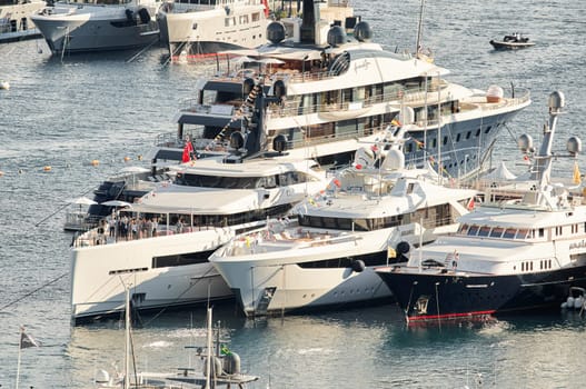 Monaco, Monte Carlo, 01 October 2022 - The famous motorboat exhibition at morning, mega yacht show, novelties of the boating industry. High quality photo