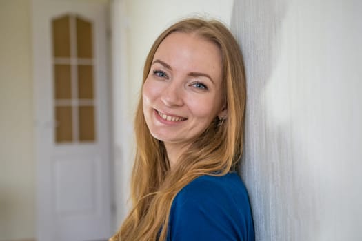 Portrait of a smiling young Slavic woman