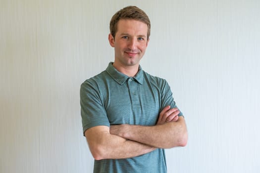 Portrait of a young european man at home