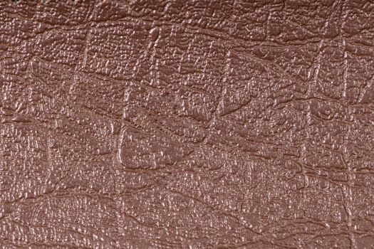 Closeup of detailed brown leather texture background.