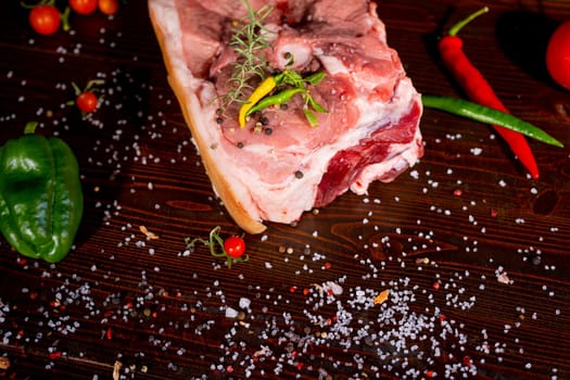 Raw rib eye beef steak on a black background. High quality photo