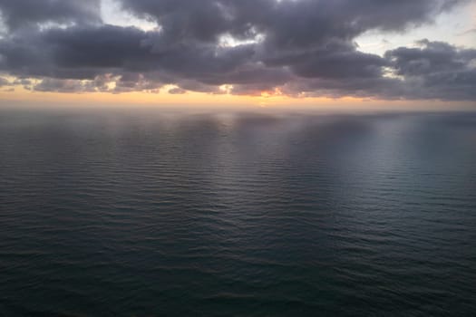 Aerial photographic documentation of a sunset over the Mediterranean sea 