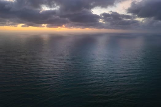 Aerial photographic documentation of a sunset over the Mediterranean sea 