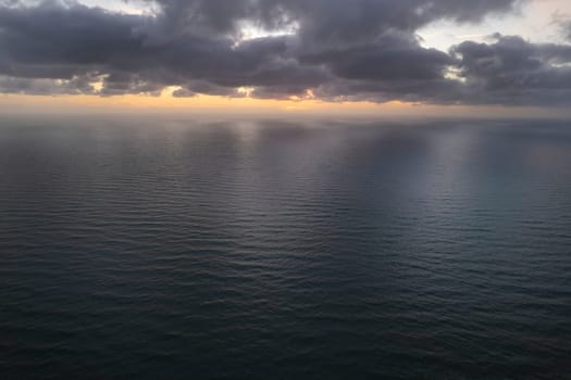 Aerial photographic documentation of a sunset over the Mediterranean sea 