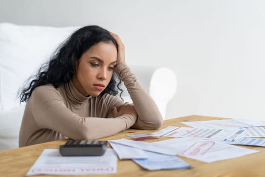 Stressed young woman has financial problems with credit card debt to pay crucial show concept of bad personal money and mortgage pay management crisis. sad and unhappy