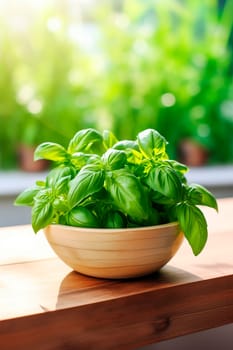 Basil harvest in a bowl on a garden background. Selective focus. Food.