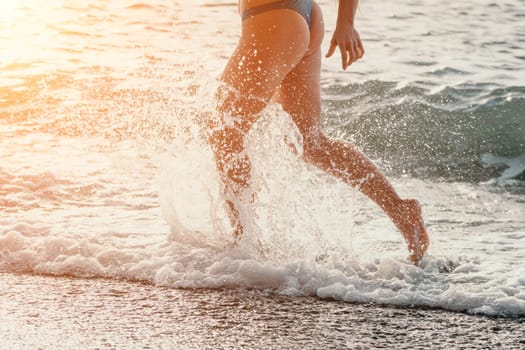 Running woman. Female runner jogging during the sunrise on beach. Woman Runner feet running on the beach at sunrise. woman fitness sunrise jog workout wellness concept.