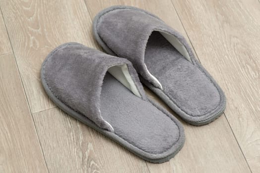 Wearing slippers at home concept