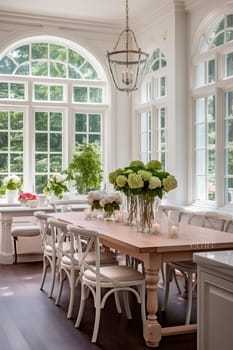 White kitchen with large windows. Selective focus. Nature.