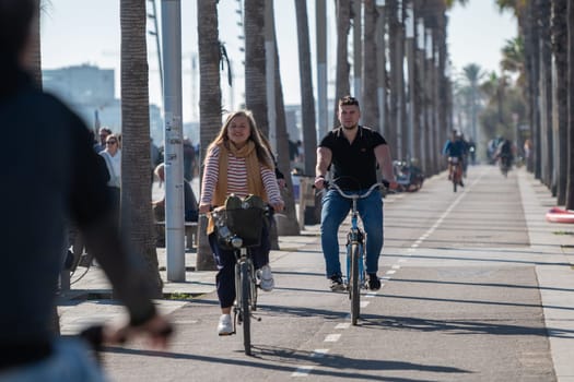 Barcelona, Spain: November 19, 2023: Bike path in Barcelona on the beach of LA Barceloneta in the capital of Catalonia in Spain in 2023.