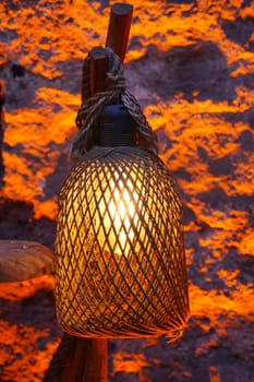 vintage lantern lamp against a wall .