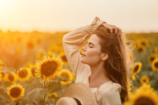 Woman in the sunflowers field. Summer time. Young beautiful woman standing in sunflower field.