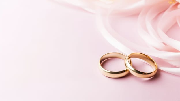 Pink pastel background with copy space and wedding golden rings AI