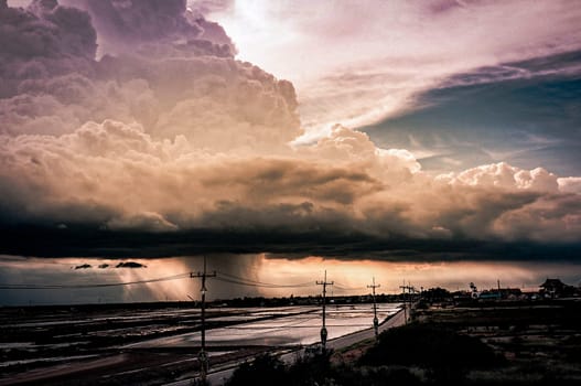 Nature Drama Unleashed Arcus Cloud Storm Over Rural Road and Salt Farm in Thailand