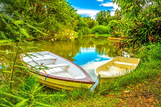 The beautiful landscape ofmall wooden rowing boat on a calm lake.