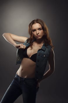 Attractive young girl posing at fashion casting. Studio photo