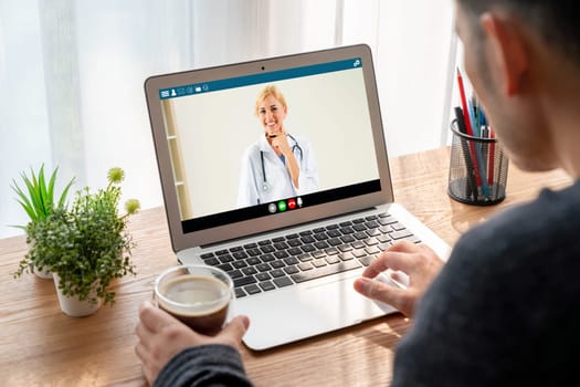 Doctor video call online by modish telemedicine software application for virtual meeting with patient