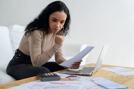 Stressed young woman has financial problems with credit card debt to pay crucial show concept of bad personal money and mortgage pay management crisis.