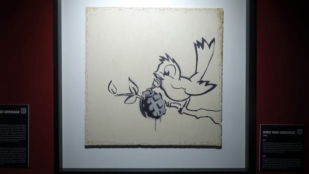 Stockholm, Sweden, December 29 2023. Art exhibition. The mystery of Banksy A genius mind. Bird.