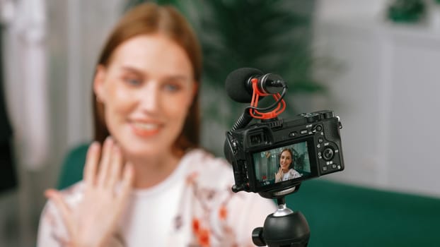 Woman influencer shoot live streaming vlog video review makeup prim social media or blog. Happy young girl with cosmetics studio lighting for marketing recording session broadcasting online.