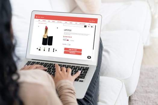 Woman shopping online on internet marketplace browsing for sale items for modern lifestyle and use credit card for online payment from wallet protected by crucial cyber security software