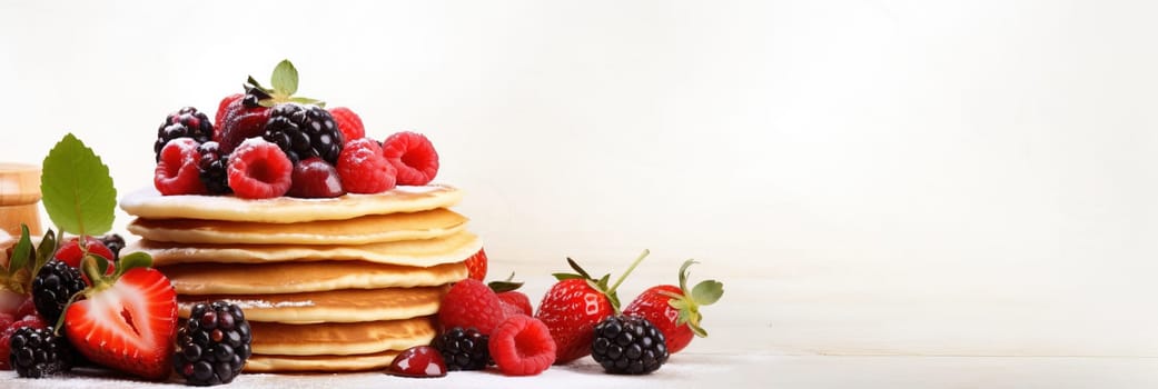 Stack of pancakes with berries. Advertising banner, web banner. Lush delicious pancakes with blueberries, raspberries and syrup for homemade breakfast. Lifestyle concept of food, cooking. Copy space