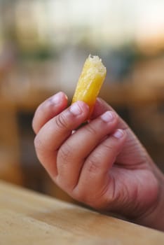 child eating french fries close up ,