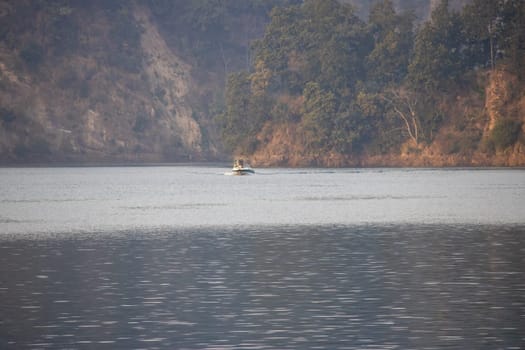 Beauty of water boats gracefully navigating Uttarakhand's rivers.High quality image