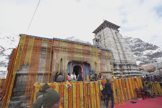 An offering of a beautiful flower garland graces Kedarnath Temple, weaving nature's elegance into sacred worship.4k footage