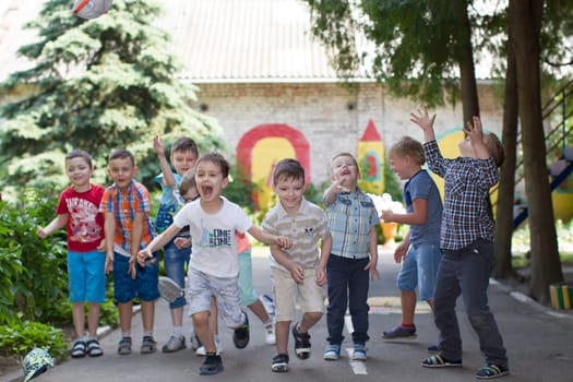 Belarus, Gomel, May 29, 2018. The kindergarten is central. Open Day.A group of children in a kindergarten on the street playing fun. Happy preschoolers