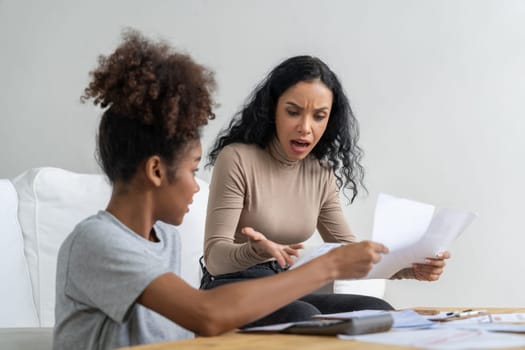 Stressed African American women has financial problems with credit card debt to pay crucial show concept of bad personal money and mortgage pay management crisis.