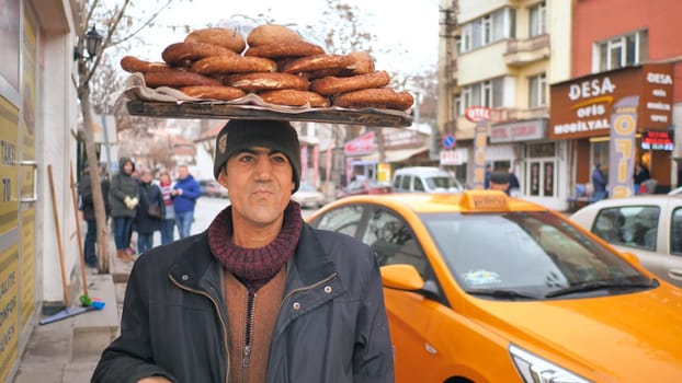 A seller of buns on the ancient streets of the Turkish capital Ankara.