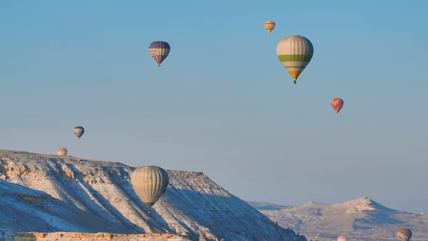 Color balloons in the sunrise sky. Cappadocia, Turkey