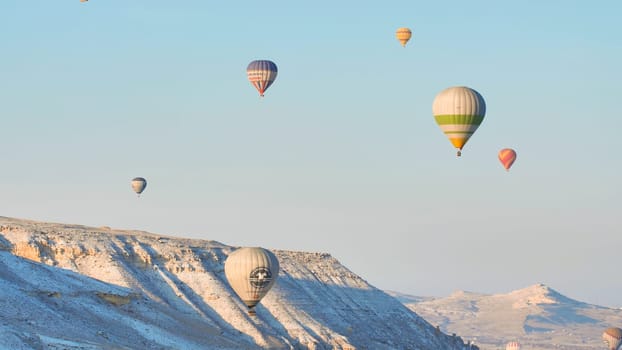Color balloons in the sunrise sky. Cappadocia, Turkey