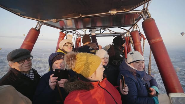 Russian tourists in a balloon in Cappadocia. Turkey.