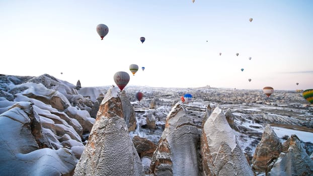 Multi-colored balls in Cappadocia on the background of volcanic rocks