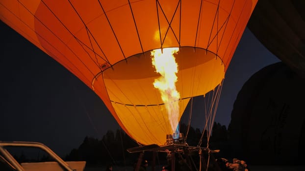 Heating the balloon with fire. Turkey. Cappadocia