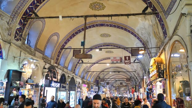 People shopping in the Grand Bazar in Istanbul, Turkey, one of the largest covered markets in the world, Istanbul.