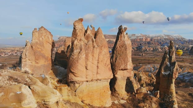 Beautiful Nature of Cappadocia on with balloons on a background of camel rocks. Turkey