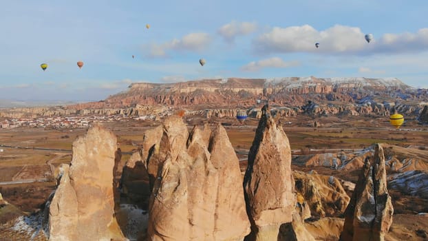 Beautiful Nature of Cappadocia on with balloons on a background of camel rocks. Turkey