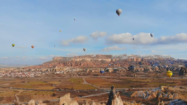 Beautiful Nature of Cappadocia on with balloons on a background of camel rocks. Turkey