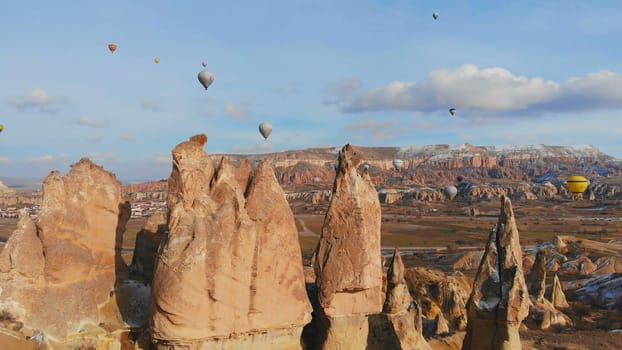 Beautiful Nature of Cappadocia on with balloons on a background of camel rocks. Turkey