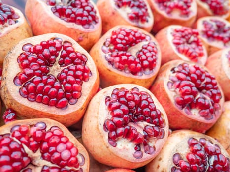 Sliced pomegranate fruits at the bazaar of Turkey