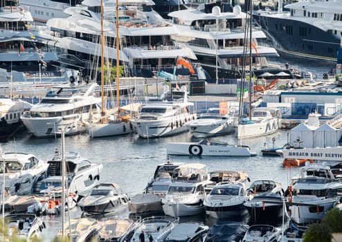 Monaco, Monte Carlo, 01 October 2022 - The famous motorboat exhibition at morning, mega yacht show, novelties of the boating industry. High quality photo